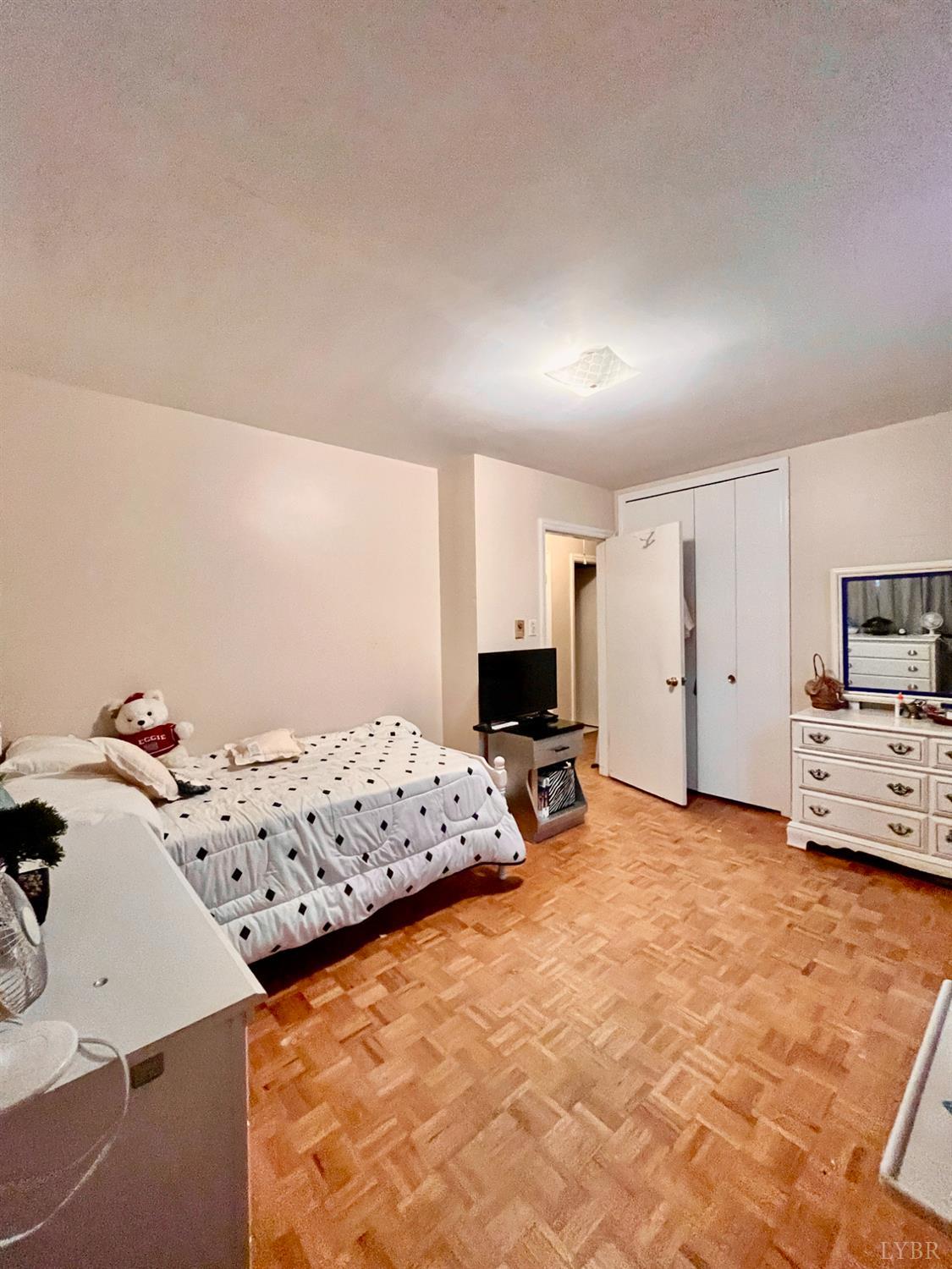 4316 Montgomery Road Lynchburg, VA 24503 - Photo 12 of 19 a living room with furniture and a flat screen tv