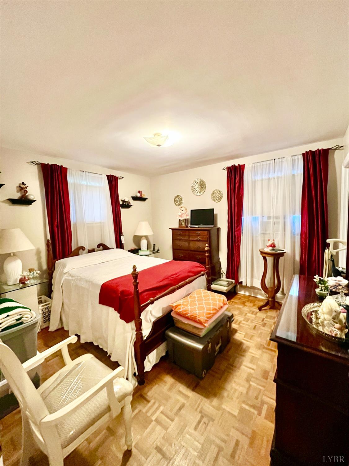 4316 Montgomery Road Lynchburg, VA 24503 - Photo 13 of 19 a bedroom with a bed and a flat screen tv