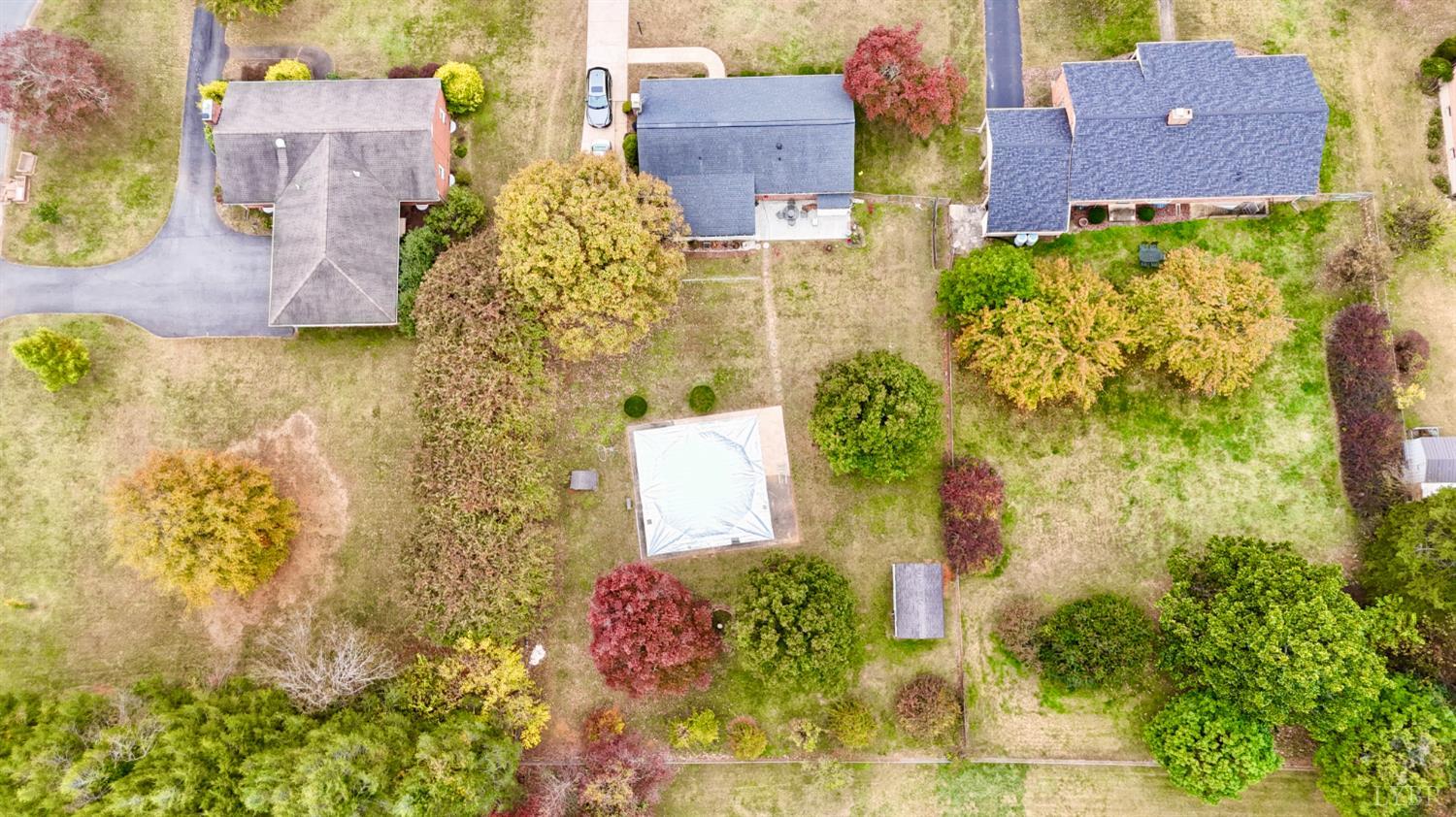 4316 Montgomery Road Lynchburg, VA 24503 - Photo 18 of 19 aerial view of a house with a yard and large trees