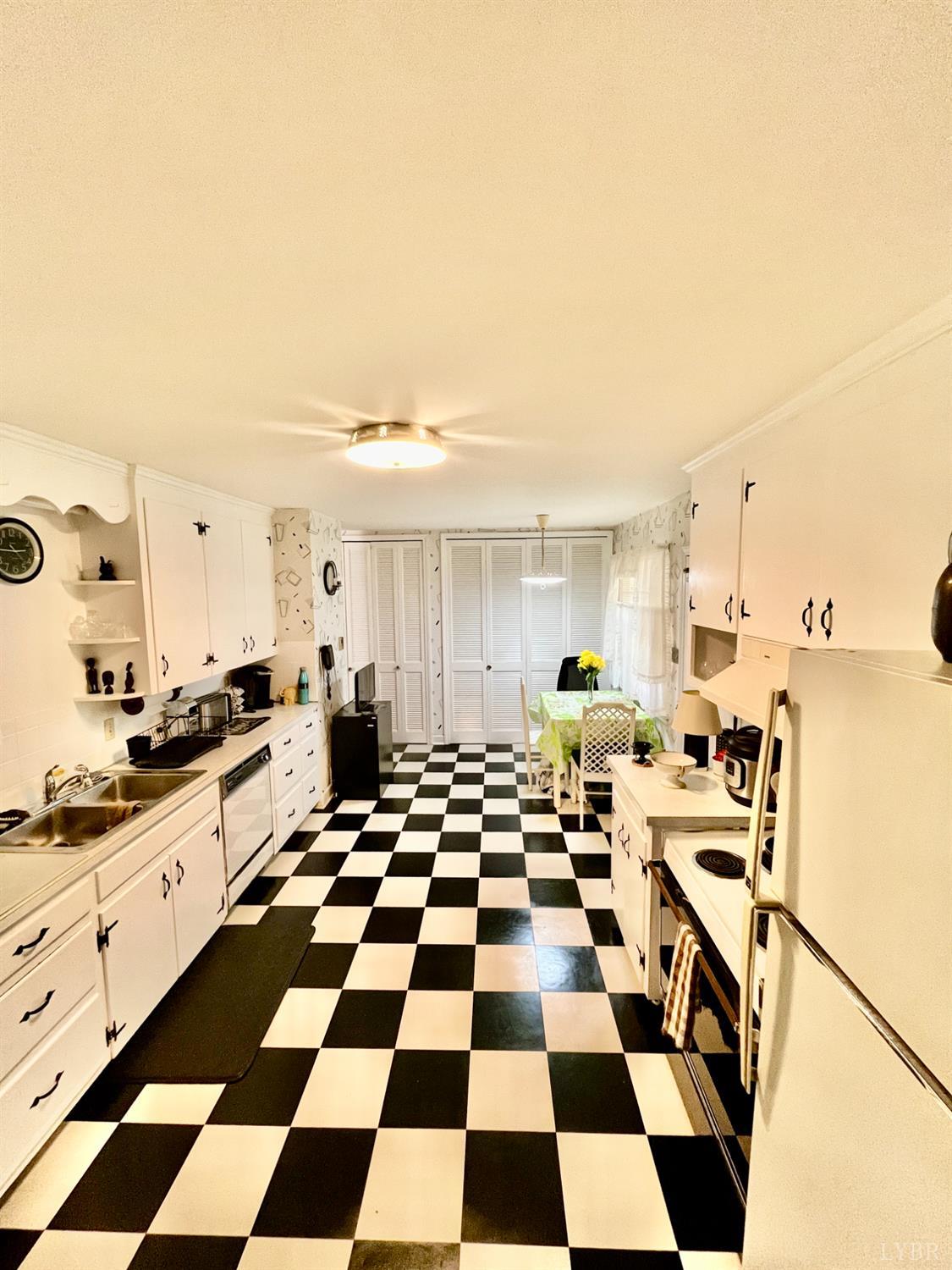 4316 Montgomery Road Lynchburg, VA 24503 - Photo 3 of 19 a room with a black white checkered floor