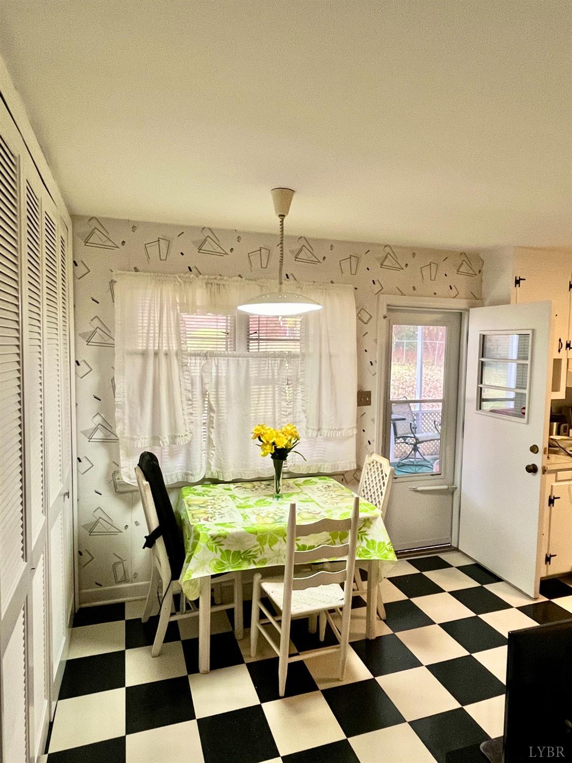 4316 Montgomery Road Lynchburg, VA 24503 - Photo 4 of 19 a view of a dining room with a table and chairs