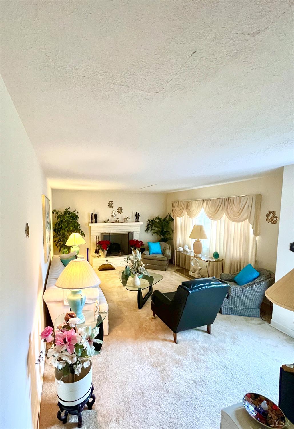 4316 Montgomery Road Lynchburg, VA 24503 - Photo 5 of 19 a living room with furniture and a table