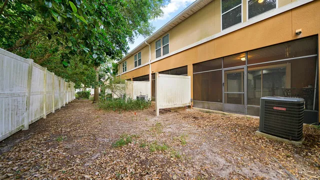 an aerial view of lake residential houses with outdoor space and swimming pool