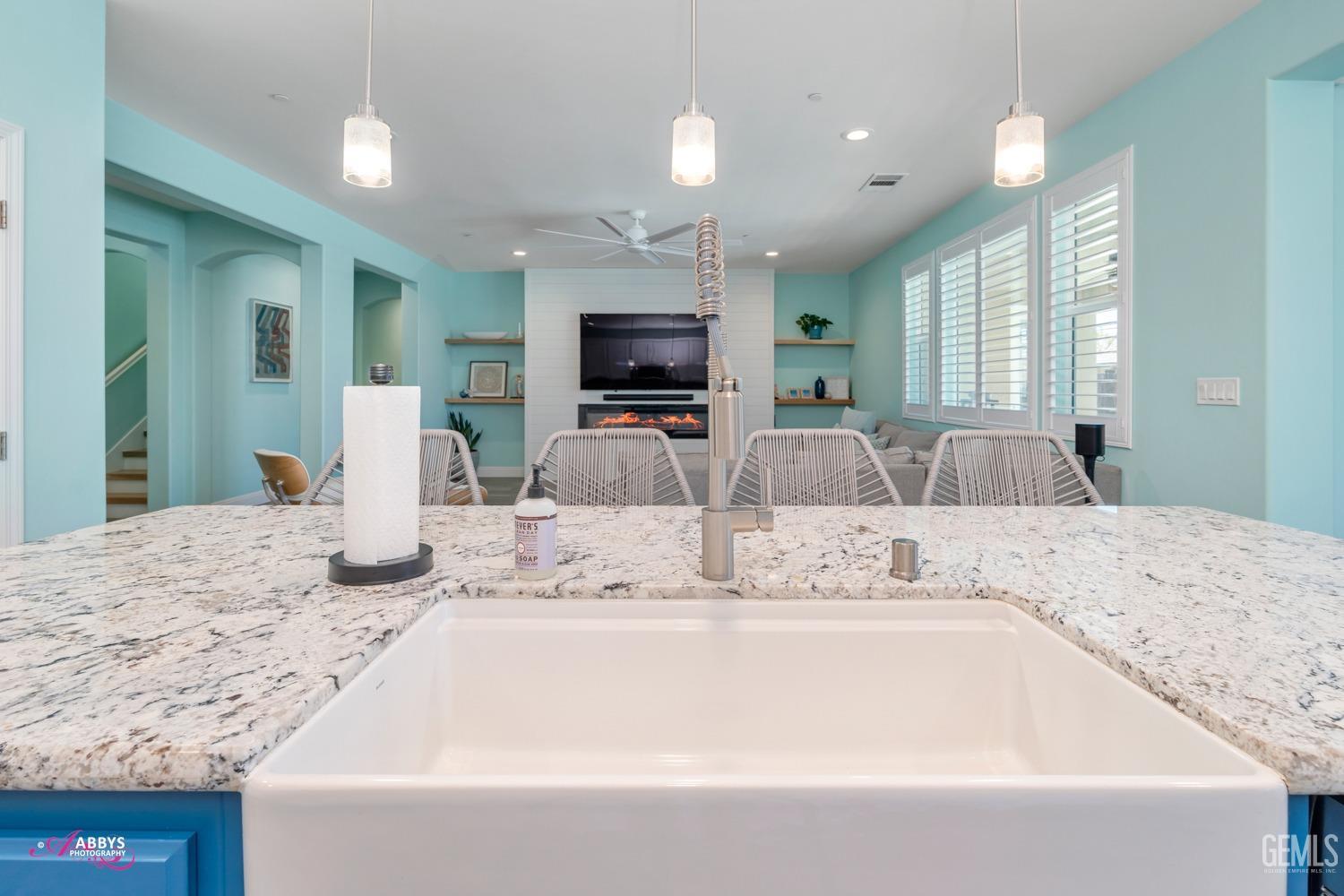 Undisclosed Address Bakersfield, CA 93314 - Photo 20 of 40 a bathroom with a granite countertop sink and a mirror