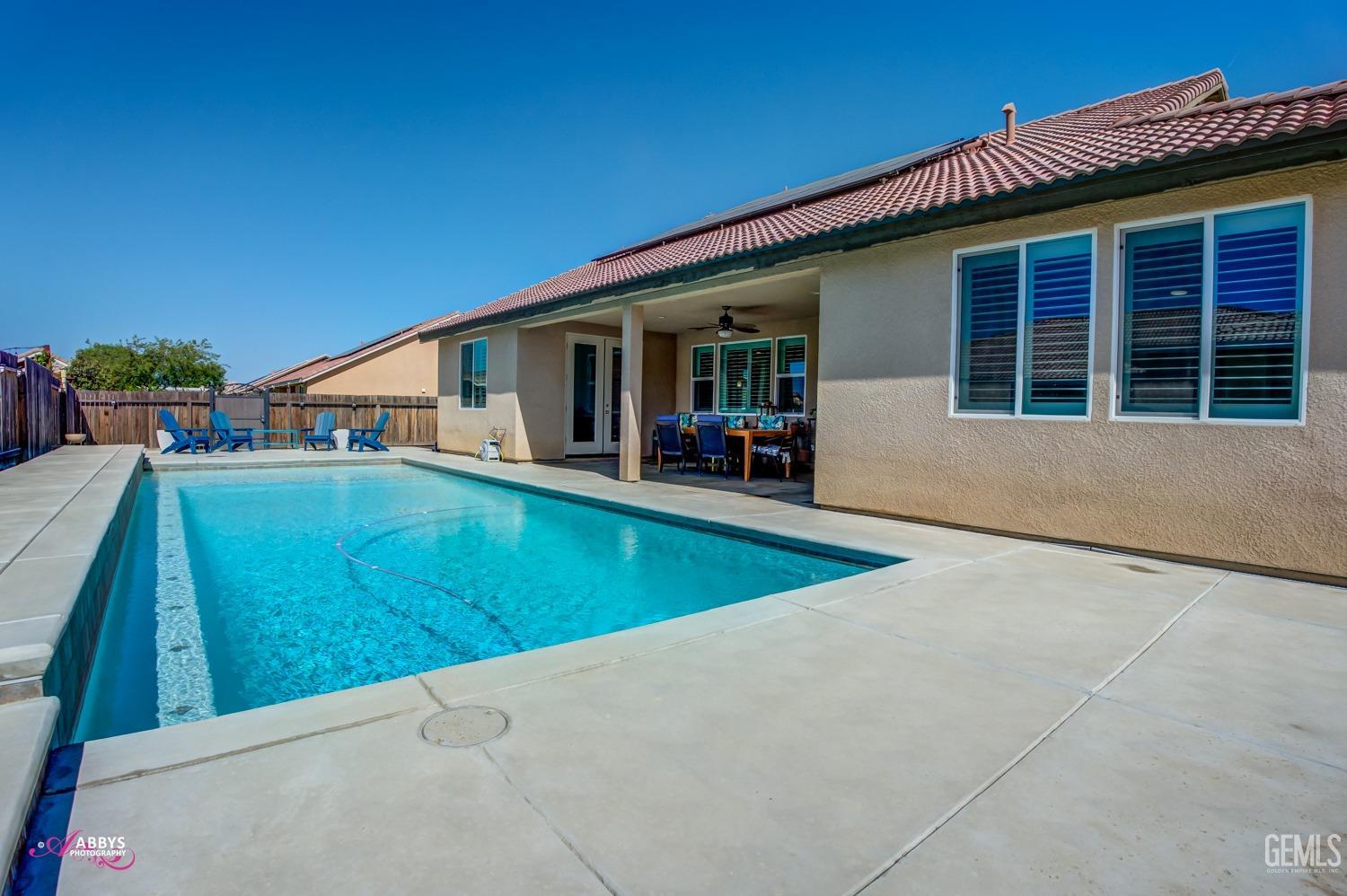 Undisclosed Address Bakersfield, CA 93314 - Photo 38 of 40 a view of a house with pool
