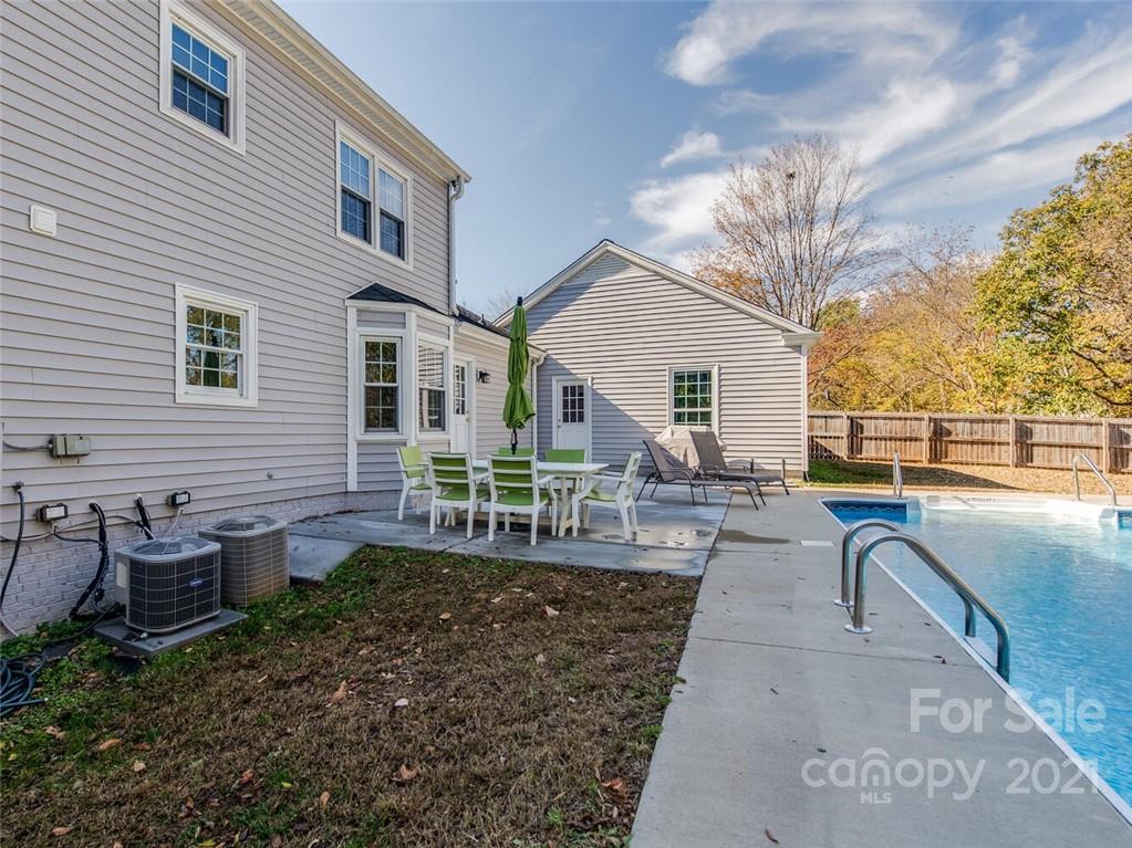 4312 Truscott Road Charlotte, NC 28226 - Photo 29 of 31 a view of a house with backyard and sitting area