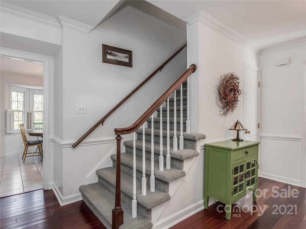 4312 Truscott Road Charlotte, NC 28226 - Photo 5 of 31 a view of entryway and hall with wooden floor