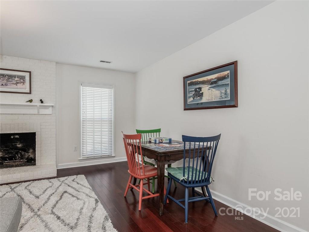 4312 Truscott Road Charlotte, NC 28226 - Photo 7 of 31 a view of a livingroom with furniture and a fireplace