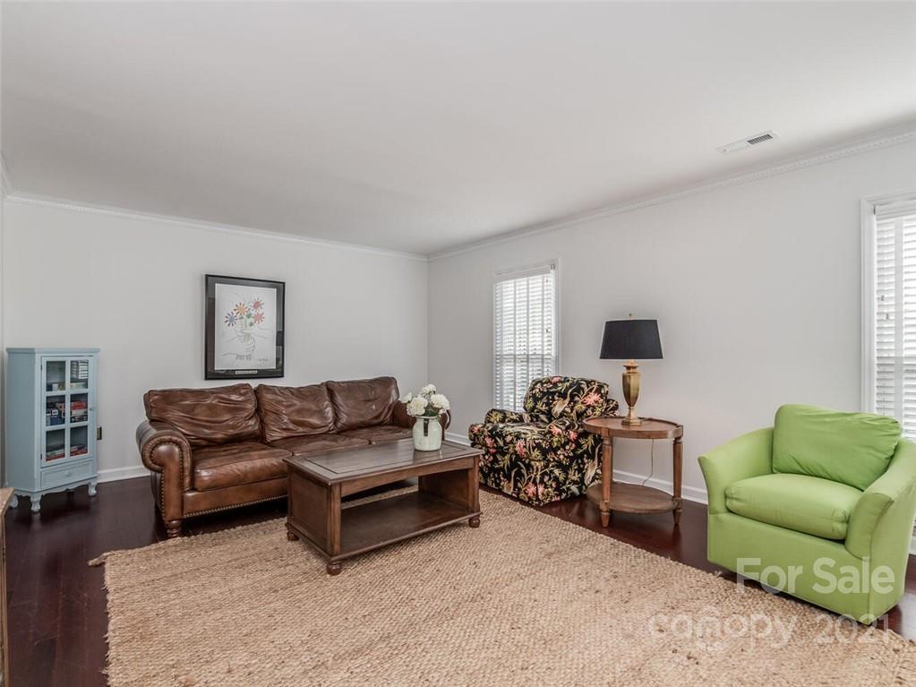 4312 Truscott Road Charlotte, NC 28226 - Photo 8 of 31 a living room with furniture and a large window