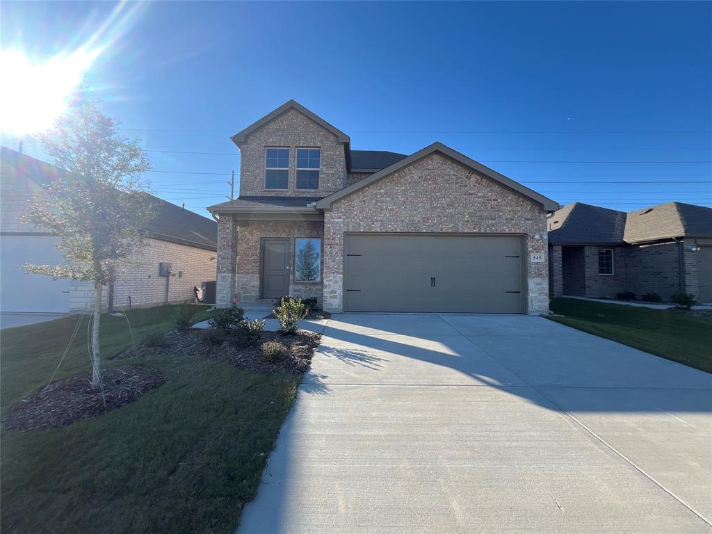 545 Epiphany Lane Lavon, TX 75166 - Photo 1 of 1 a view of a house with backyard and garden