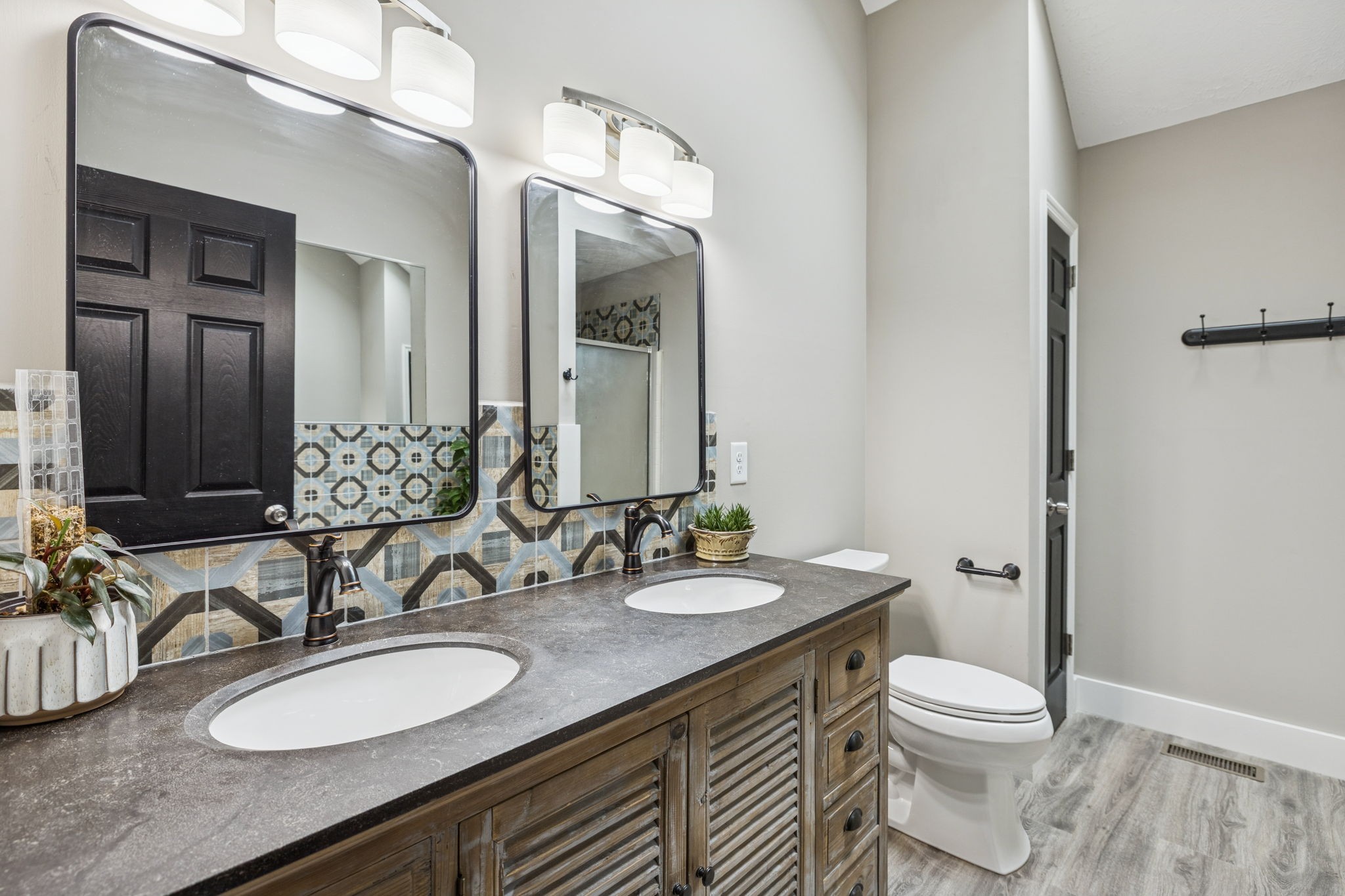 225 Burgandy Hill Road Nashville, TN 37211 - Photo 13 of 32 a bathroom with a granite countertop toilet sink and a mirror
