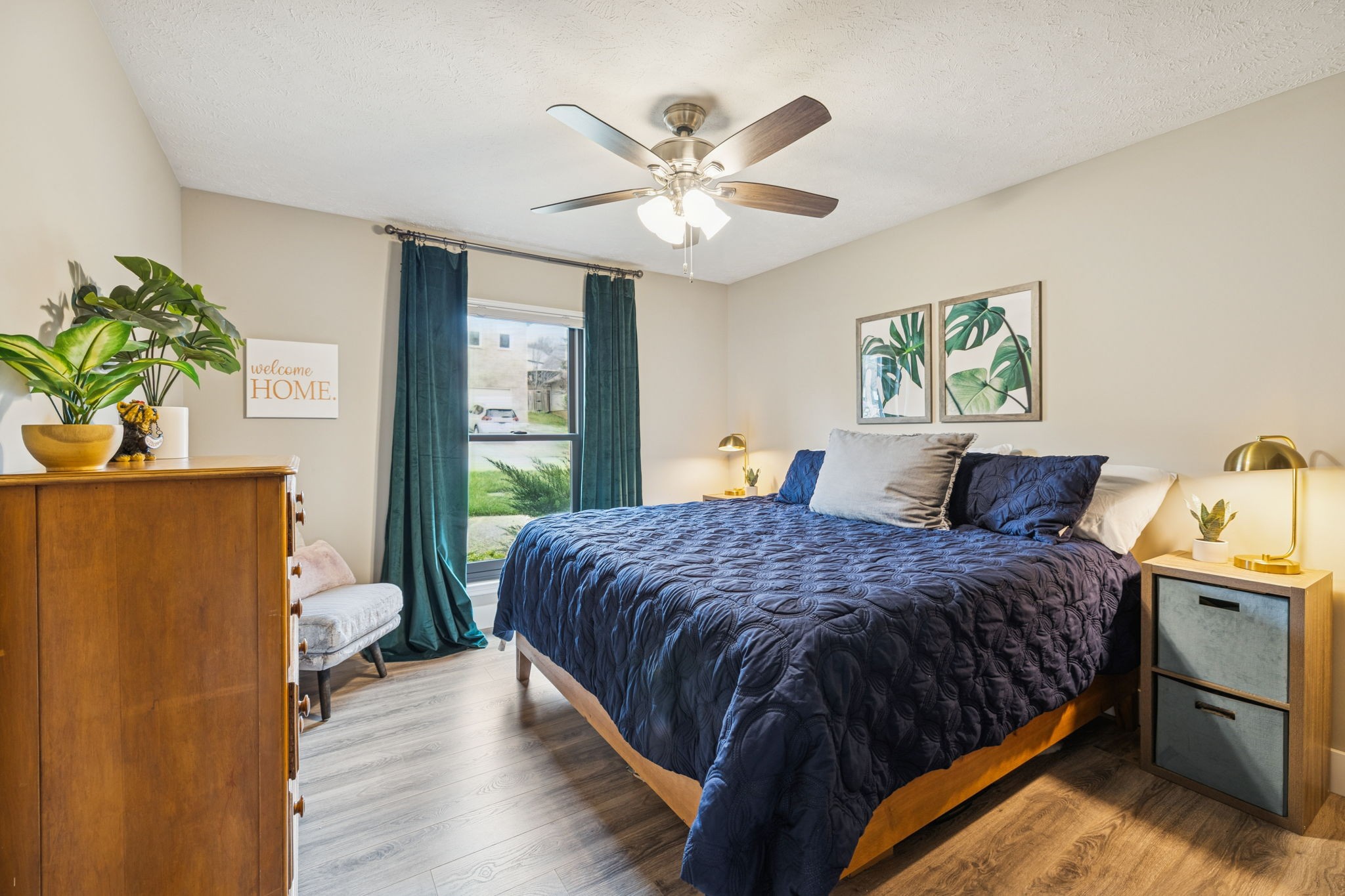225 Burgandy Hill Road Nashville, TN 37211 - Photo 17 of 32 a bedroom with a bed and a chandelier