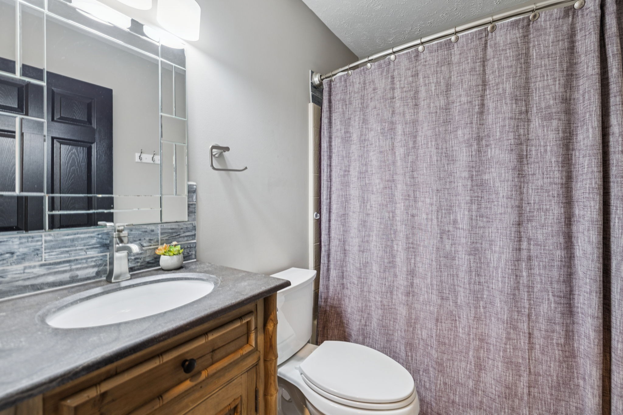225 Burgandy Hill Road Nashville, TN 37211 - Photo 19 of 32 a bathroom with a granite countertop sink and a mirror
