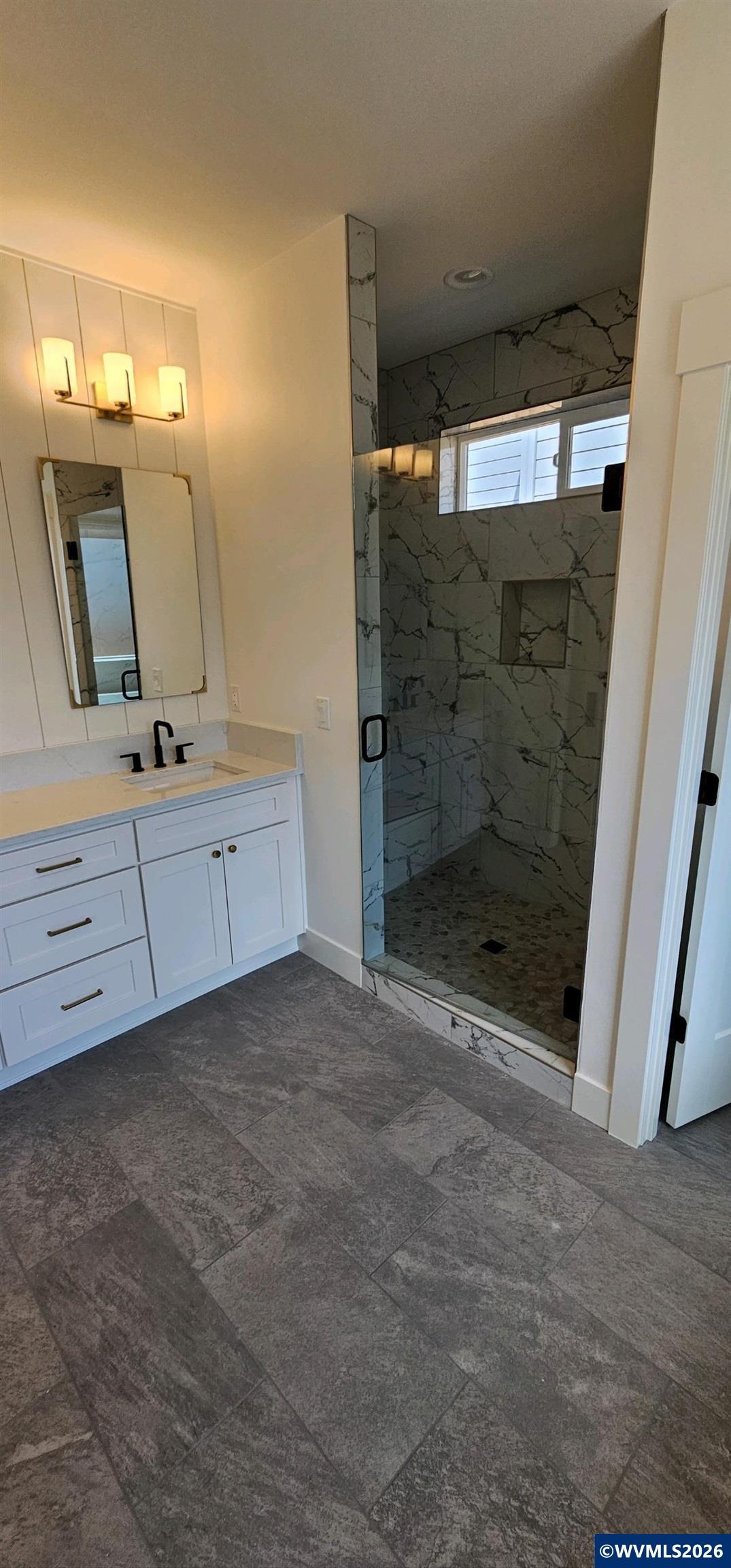 Model B Salishan Street Southeast Salem, OR 97302 - Photo 8 of 30 a view of a bathroom with mirror