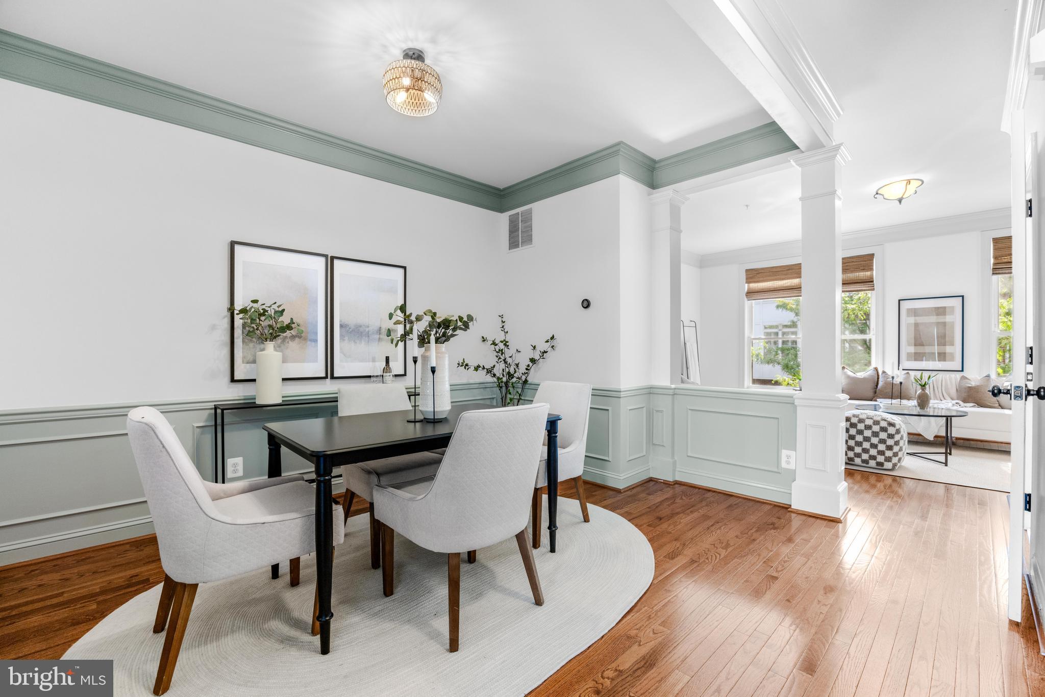1436 Steuart Street Baltimore, MD 21230 - Photo 14 of 56 a view of a dining room with furniture window and wooden floor