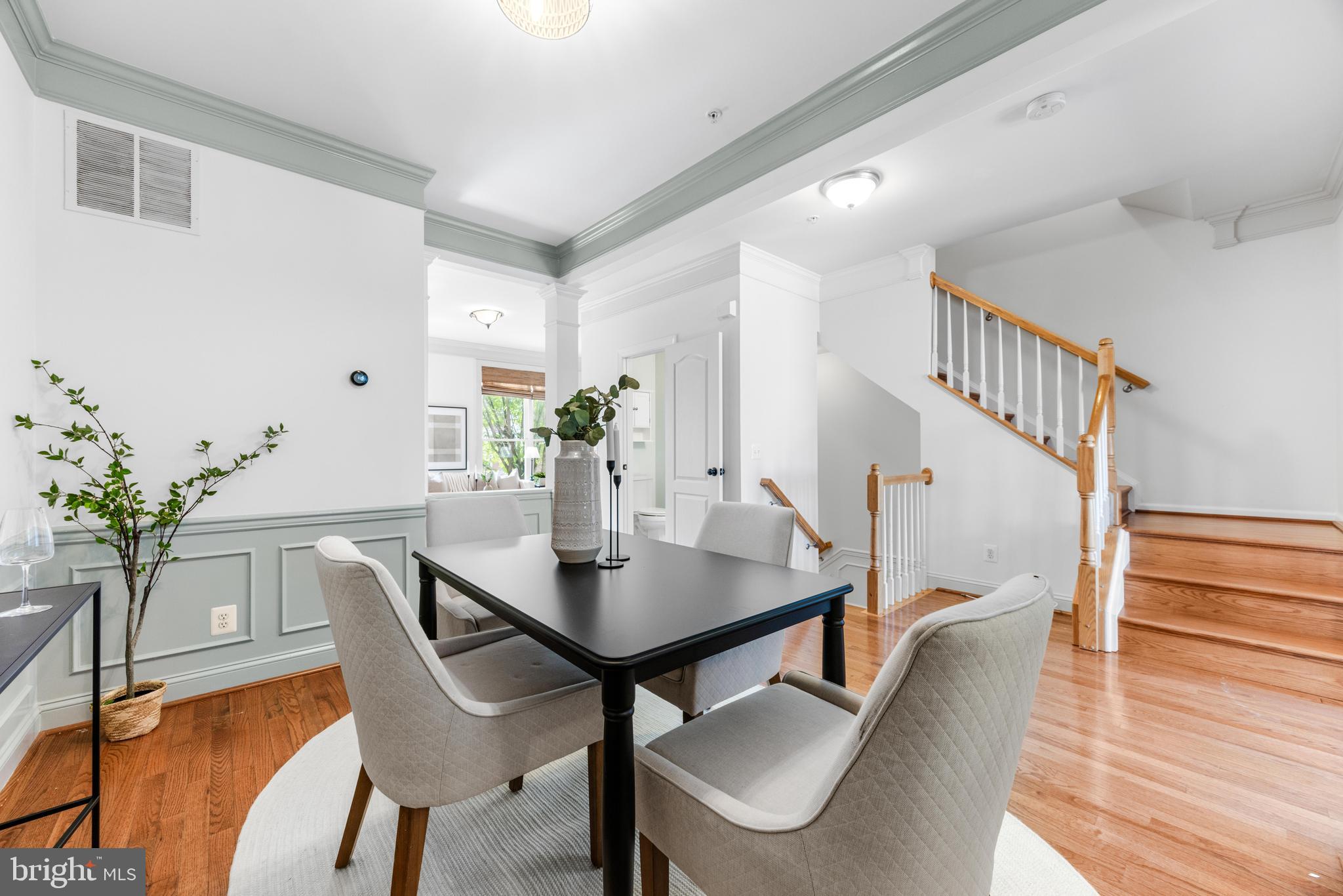 1436 Steuart Street Baltimore, MD 21230 - Photo 16 of 56 a view of a dining room with furniture and wooden floor