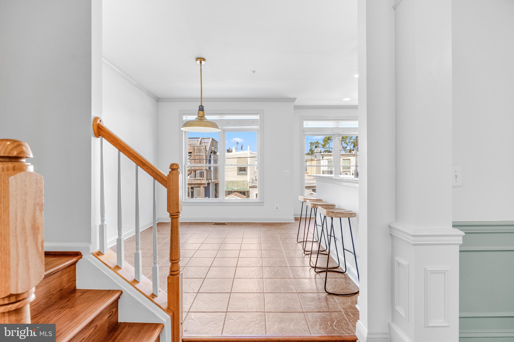 1436 Steuart Street Baltimore, MD 21230 - Photo 24 of 56 a view of entryway with workspace and stairs