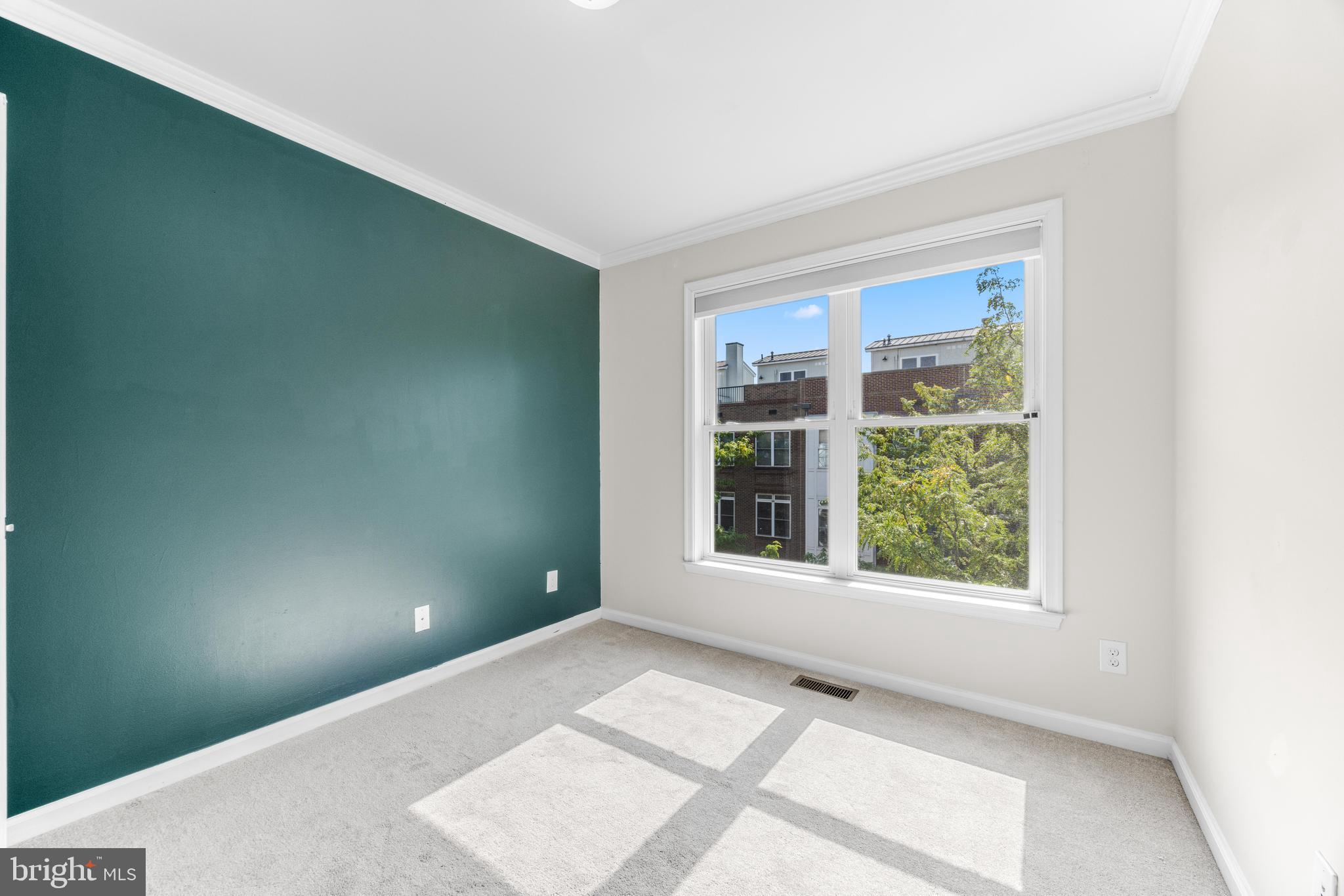 1436 Steuart Street Baltimore, MD 21230 - Photo 45 of 56 an empty room with windows