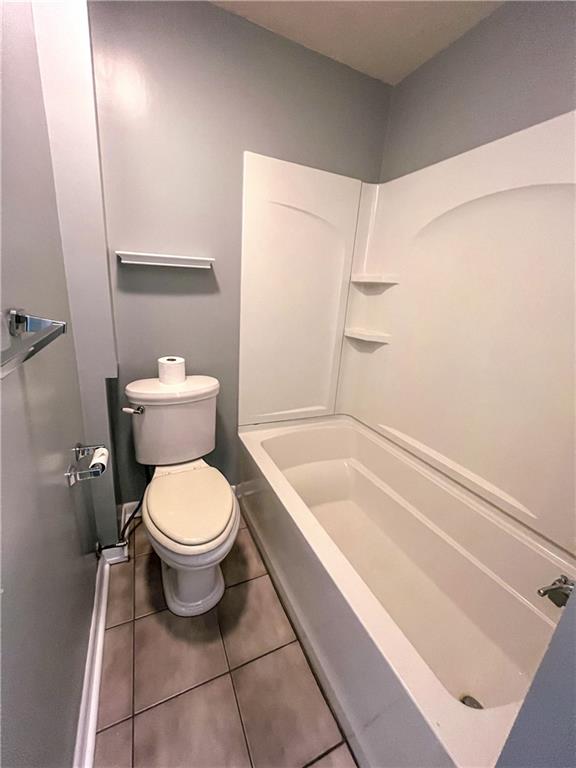 2414 East Carson Street, Unit 2 Pittsburgh, PA 15203 - Photo 13 of 15 a bathroom with a toilet a sink and bathtub