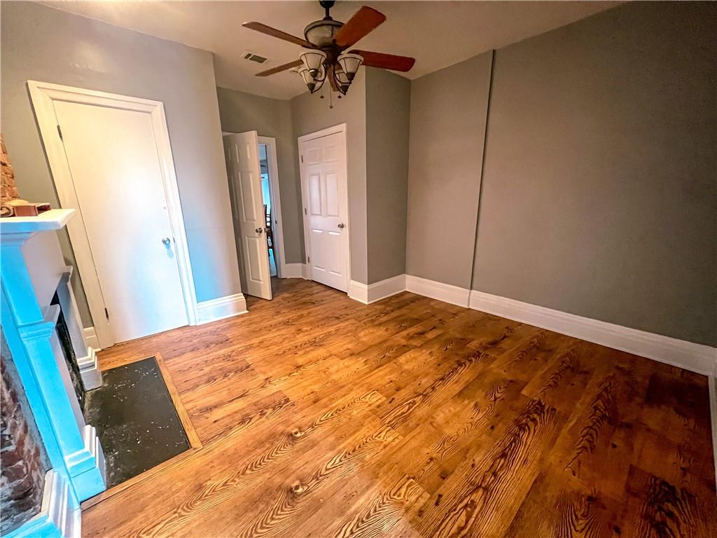 2414 East Carson Street, Unit 2 Pittsburgh, PA 15203 - Photo 8 of 15 a bedroom with a bed and a mirror