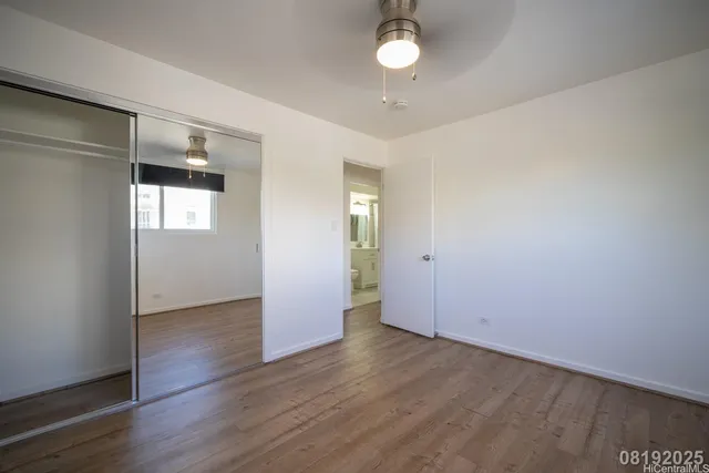 a bathroom with a toilet sink and shower