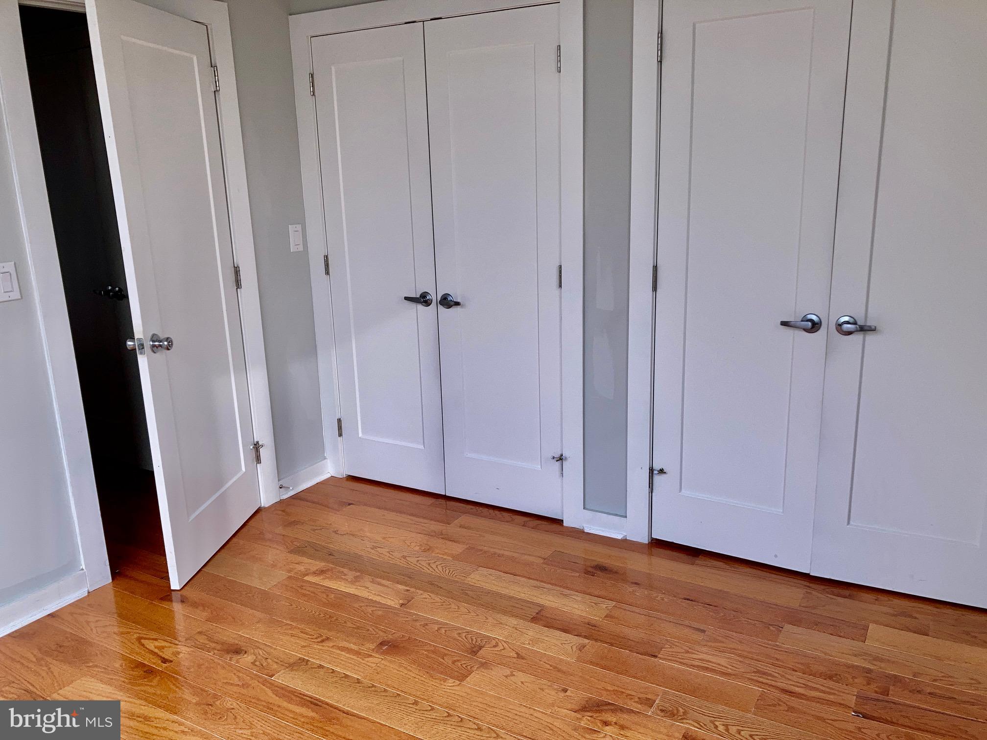 5358 Addison Street, Unit 2 Philadelphia, PA 19143 - Photo 8 of 13 a view of room with hardwood floor