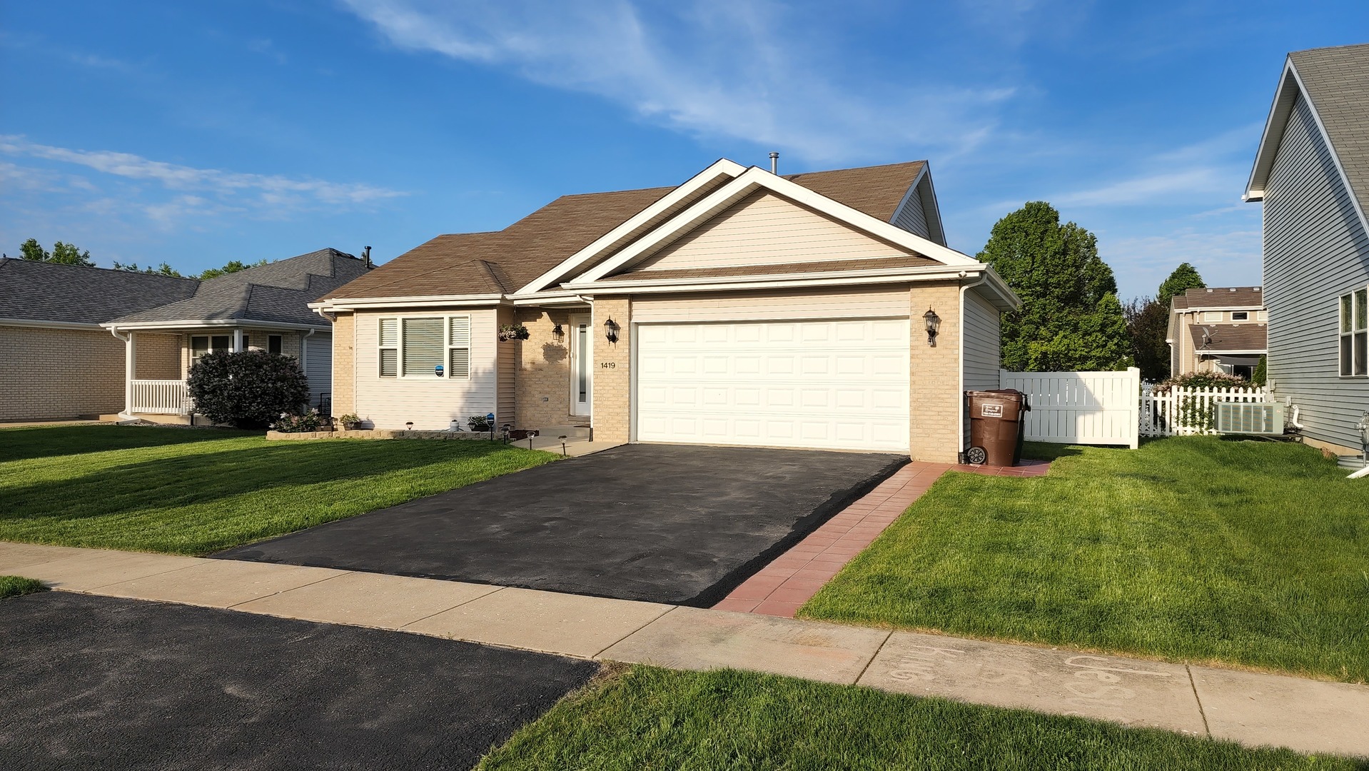 1419 Trailside Drive Beecher, IL 60401 - Photo 1 of 28 a front view of a house with a yard