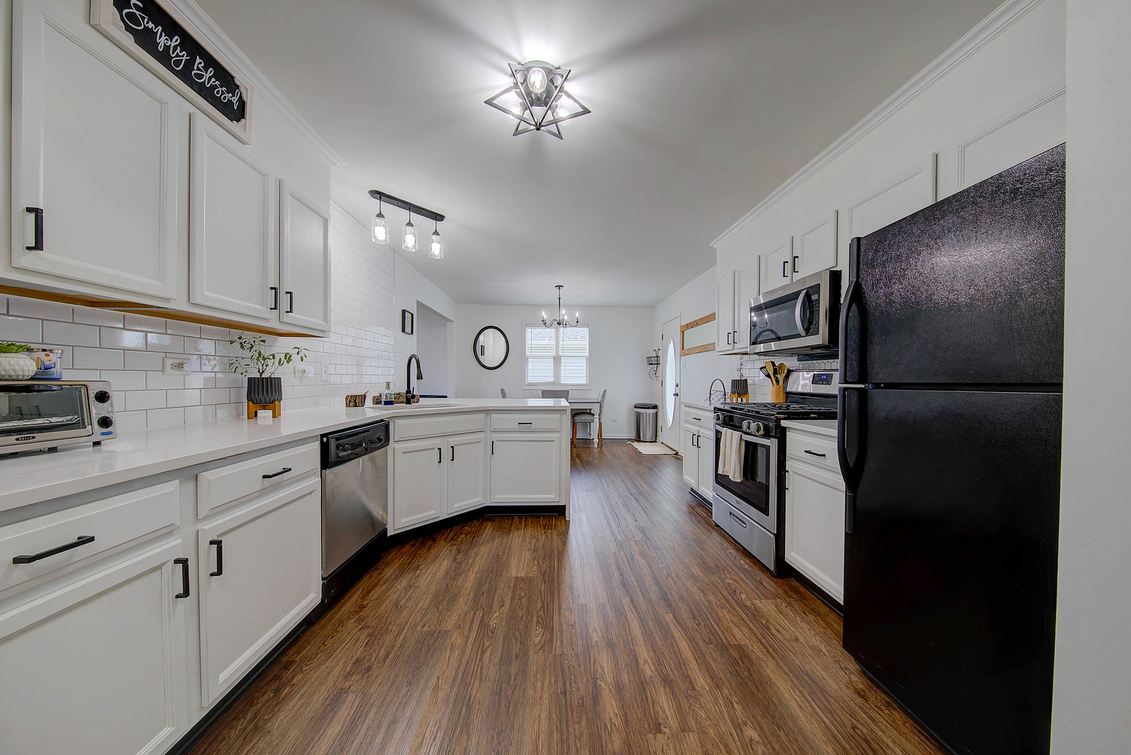 1419 Trailside Drive Beecher, IL 60401 - Photo 11 of 28 a kitchen with cabinets and stainless steel appliances