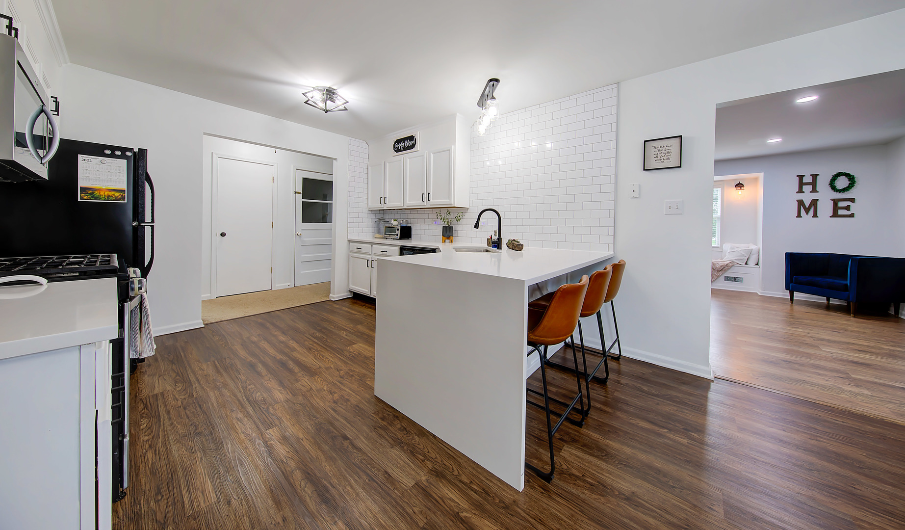 1419 Trailside Drive Beecher, IL 60401 - Photo 15 of 28 a view of a kitchen with workspace and wooden floor