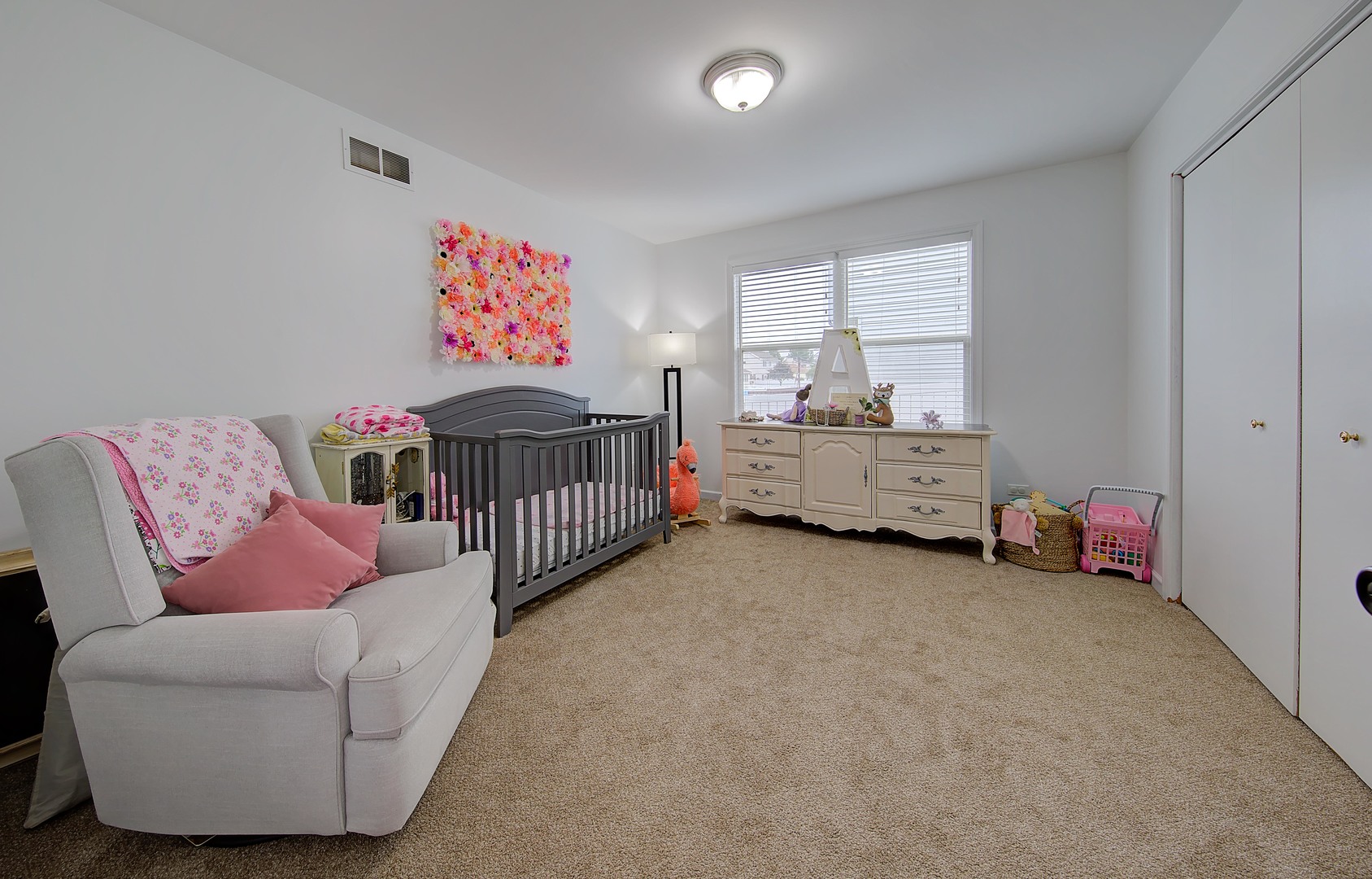 1419 Trailside Drive Beecher, IL 60401 - Photo 26 of 28 a living room with furniture and a baby crib