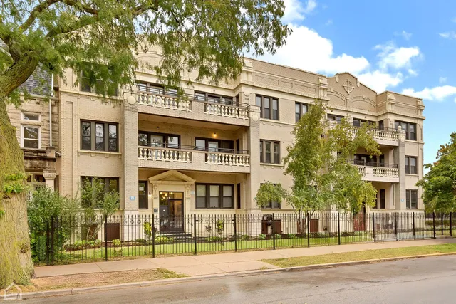 a view of a building with a garden