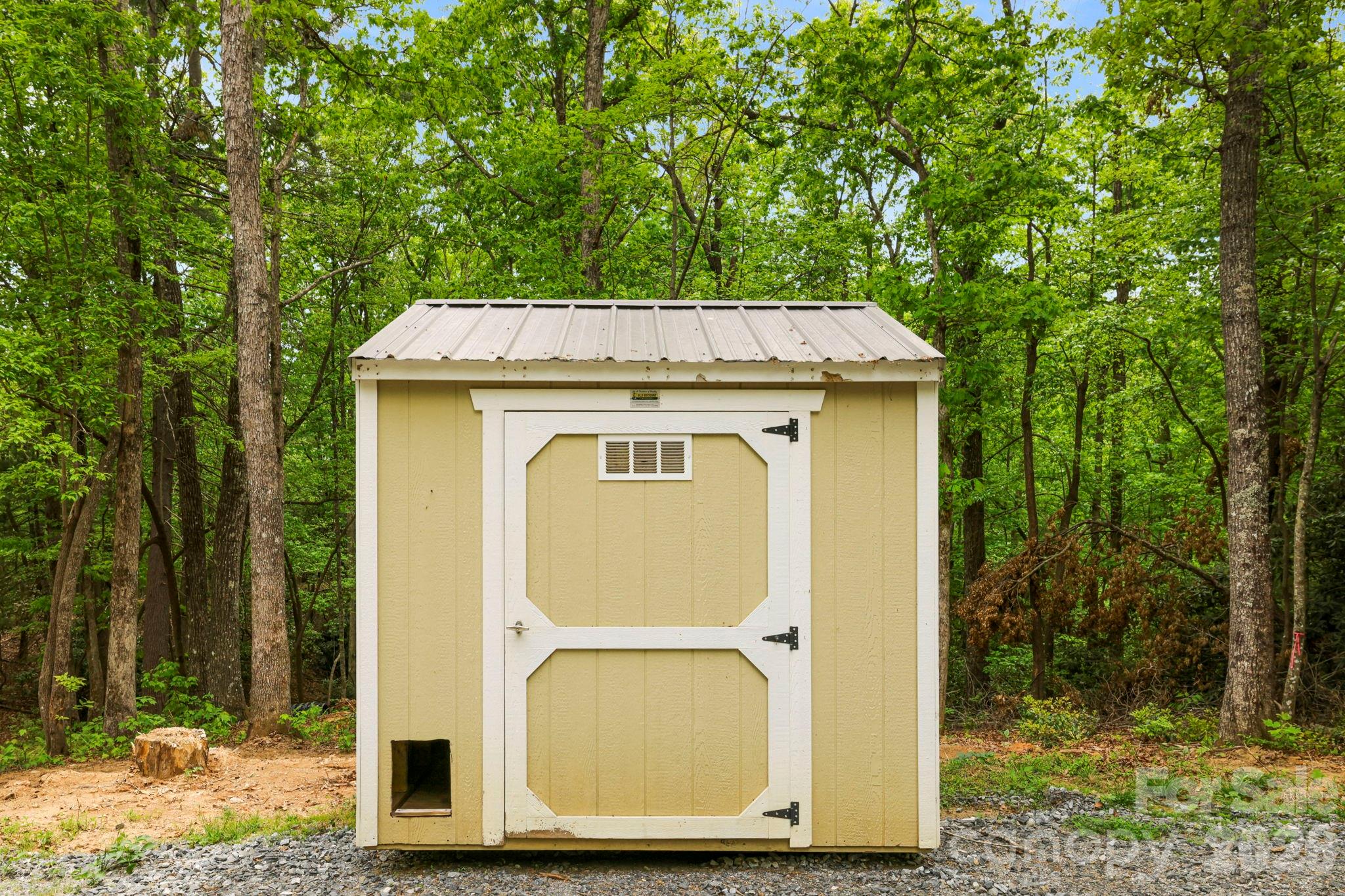 137 Bird Song Road, Unit 3 Penrose, NC 28766 - Photo 9 of 23 a house view with a outdoor space