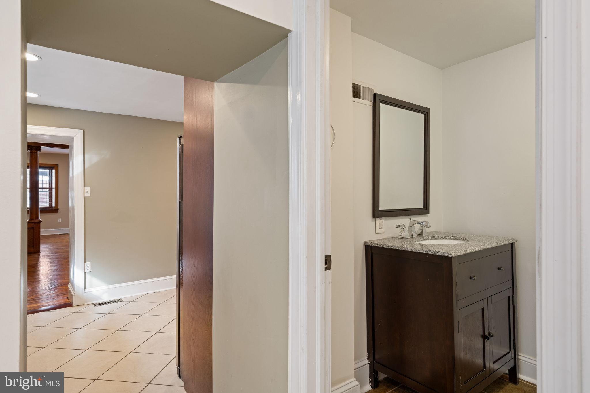 337 Carson Street Philadelphia, PA 19128 - Photo 19 of 36 a view of bathroom with a sink and mirror