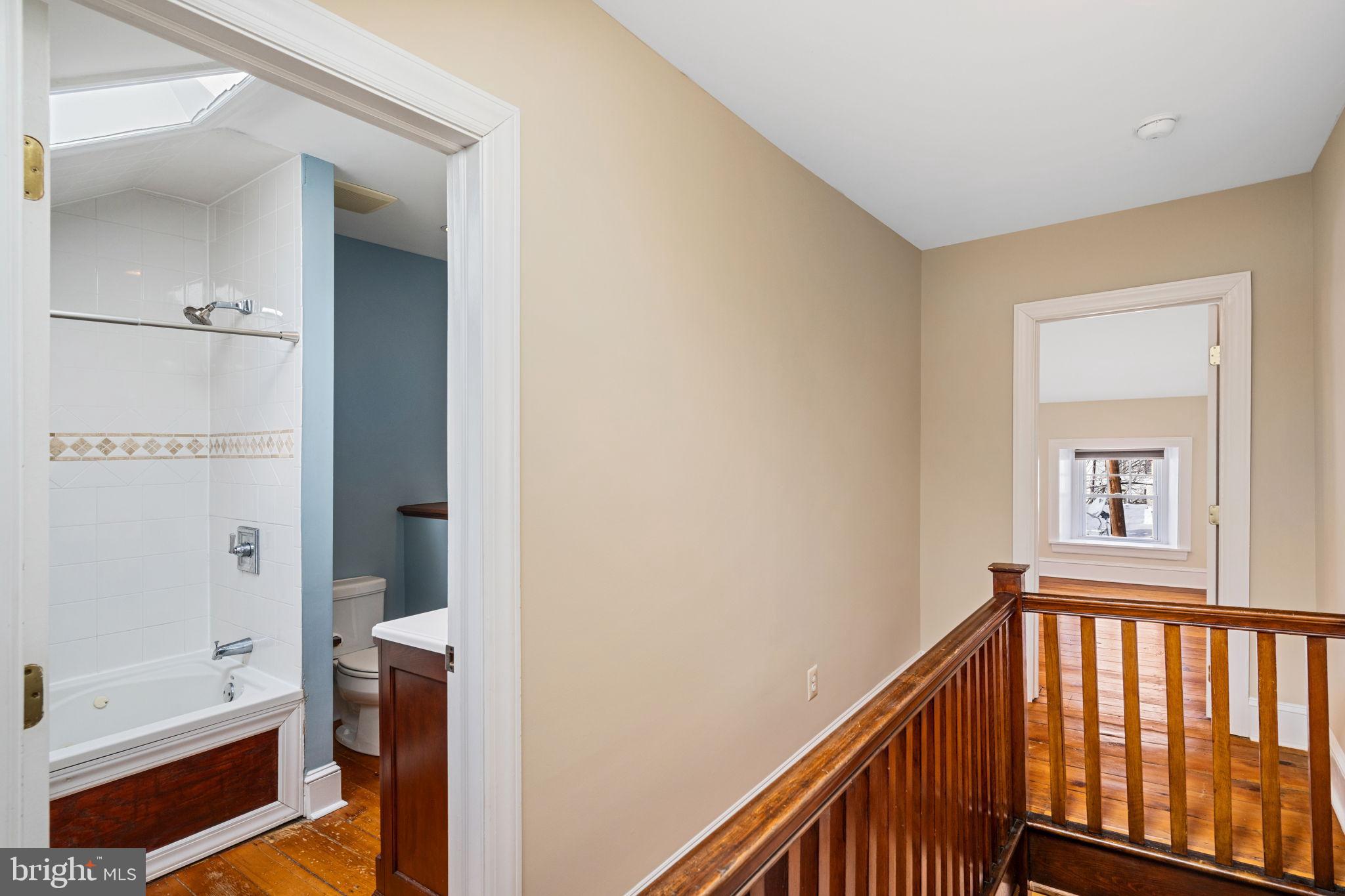 337 Carson Street Philadelphia, PA 19128 - Photo 32 of 36 a view of a hallway with a bathroom