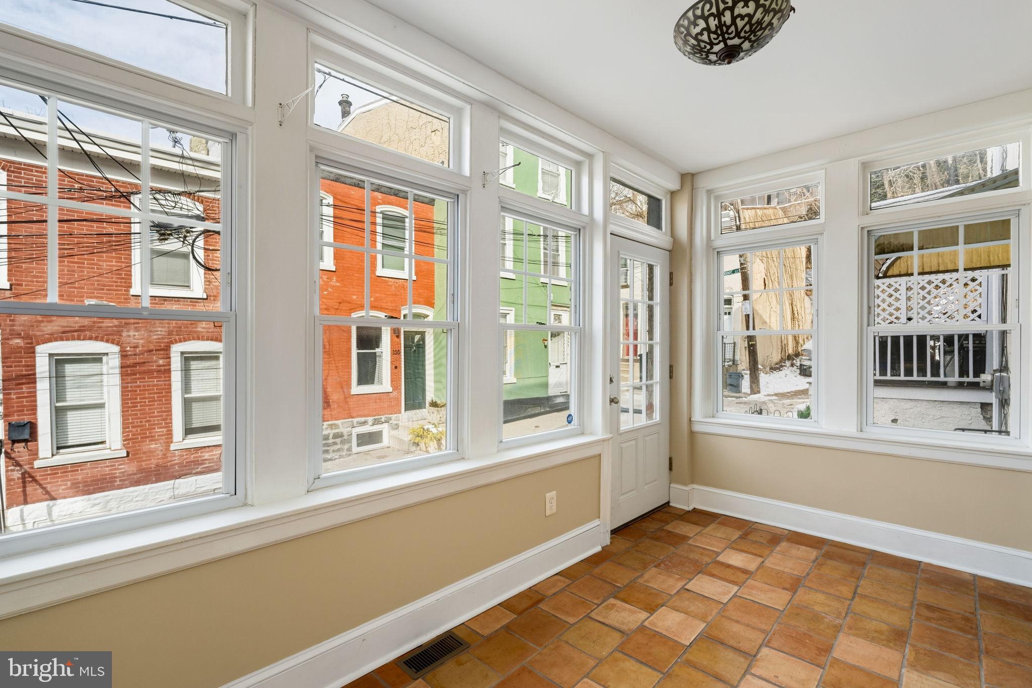 337 Carson Street Philadelphia, PA 19128 - Photo 6 of 36 a view of an empty room with a window