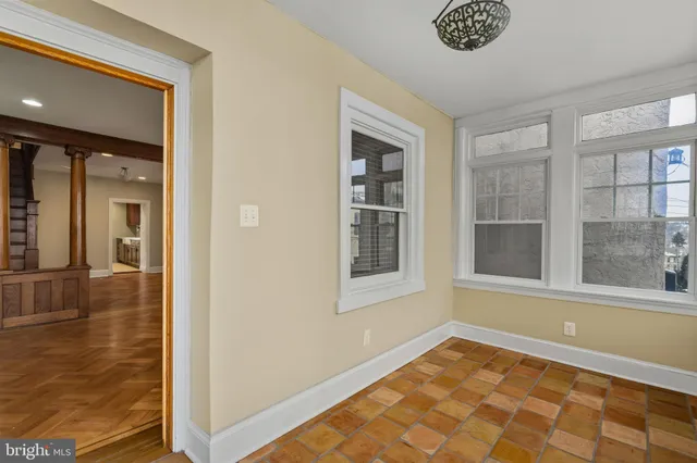 a view of an empty room and window