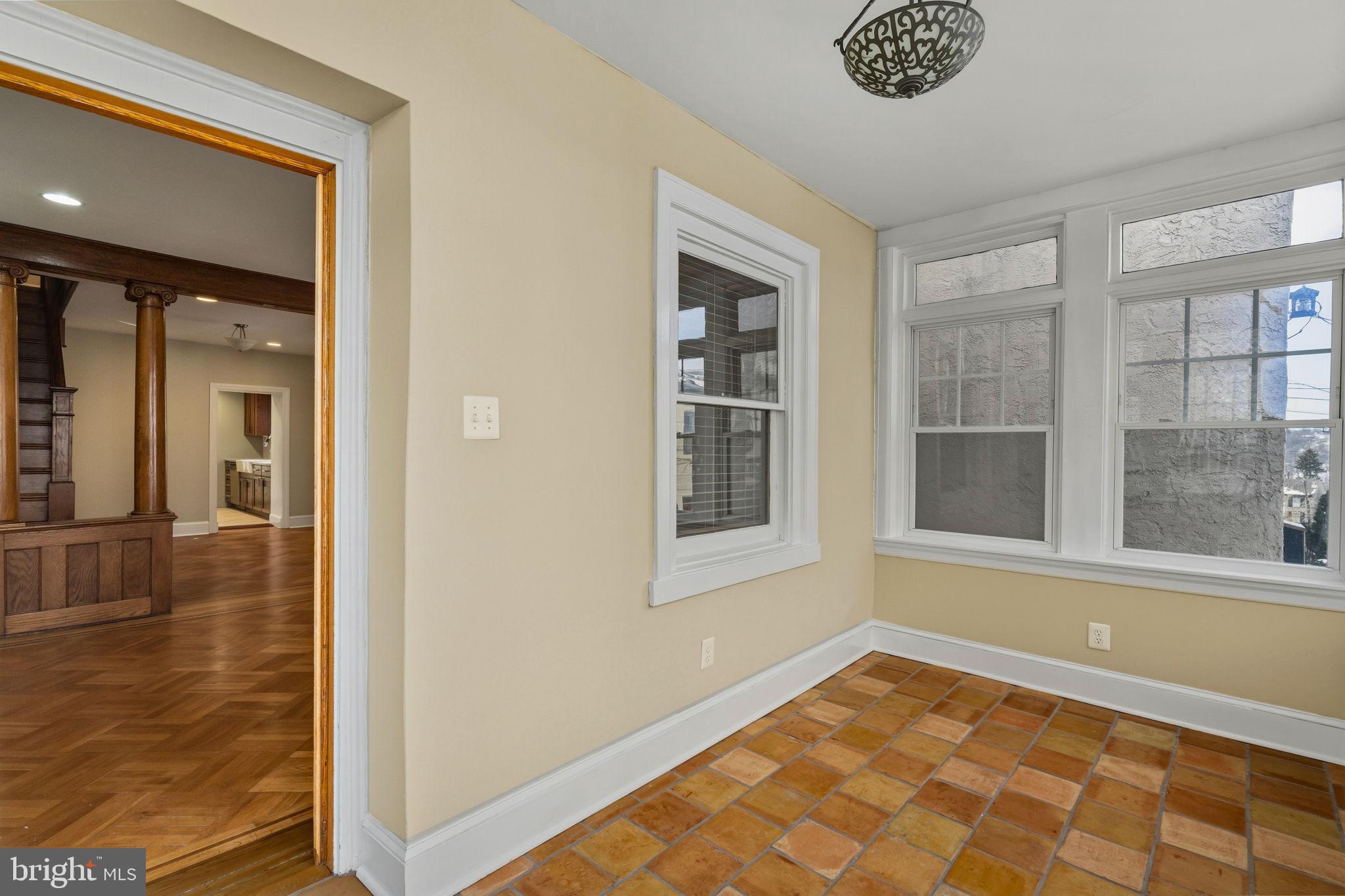 337 Carson Street Philadelphia, PA 19128 - Photo 7 of 36 a view of an empty room and window