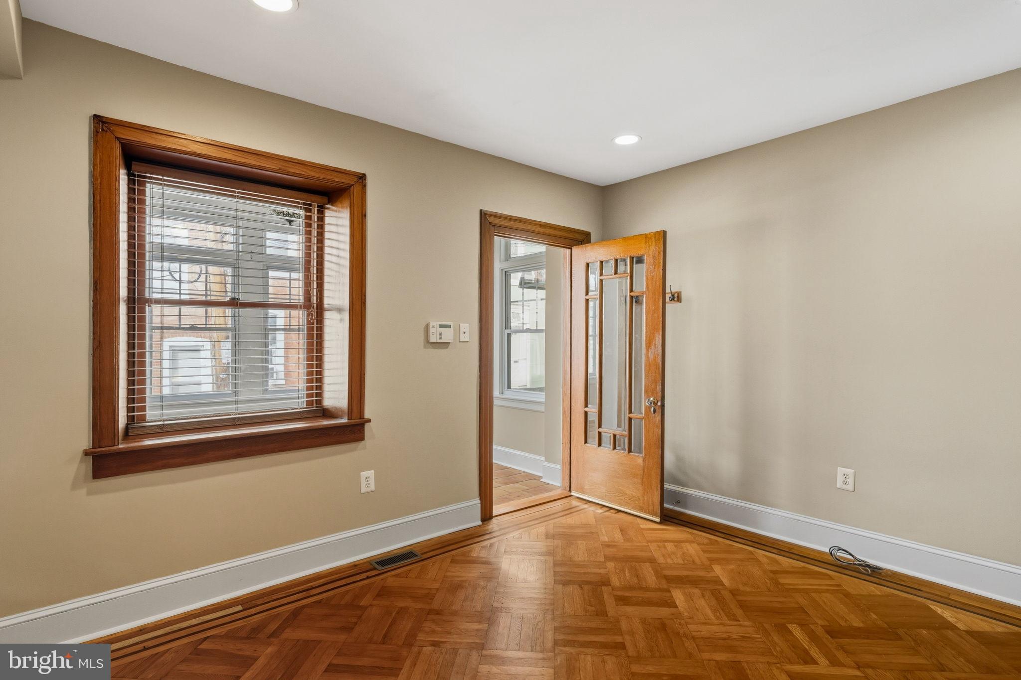337 Carson Street Philadelphia, PA 19128 - Photo 10 of 36 a view of an empty room with window and closet area