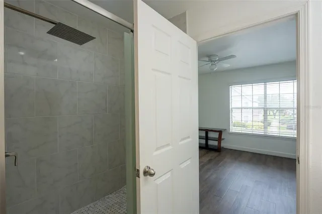 a view of an empty room with a window