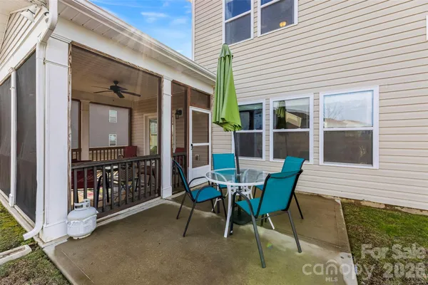 a view of a two chairs with a outdoor space