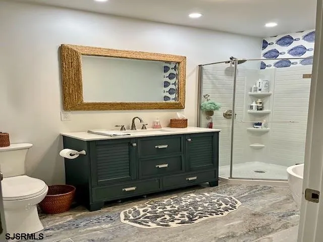 a bathroom with a bathtub and a sink