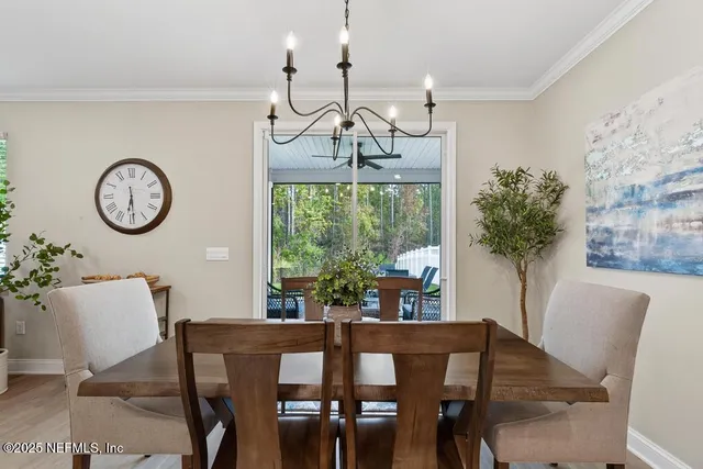a view of a lake with boats and palm trees