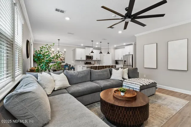 a bedroom with a bed and a desk