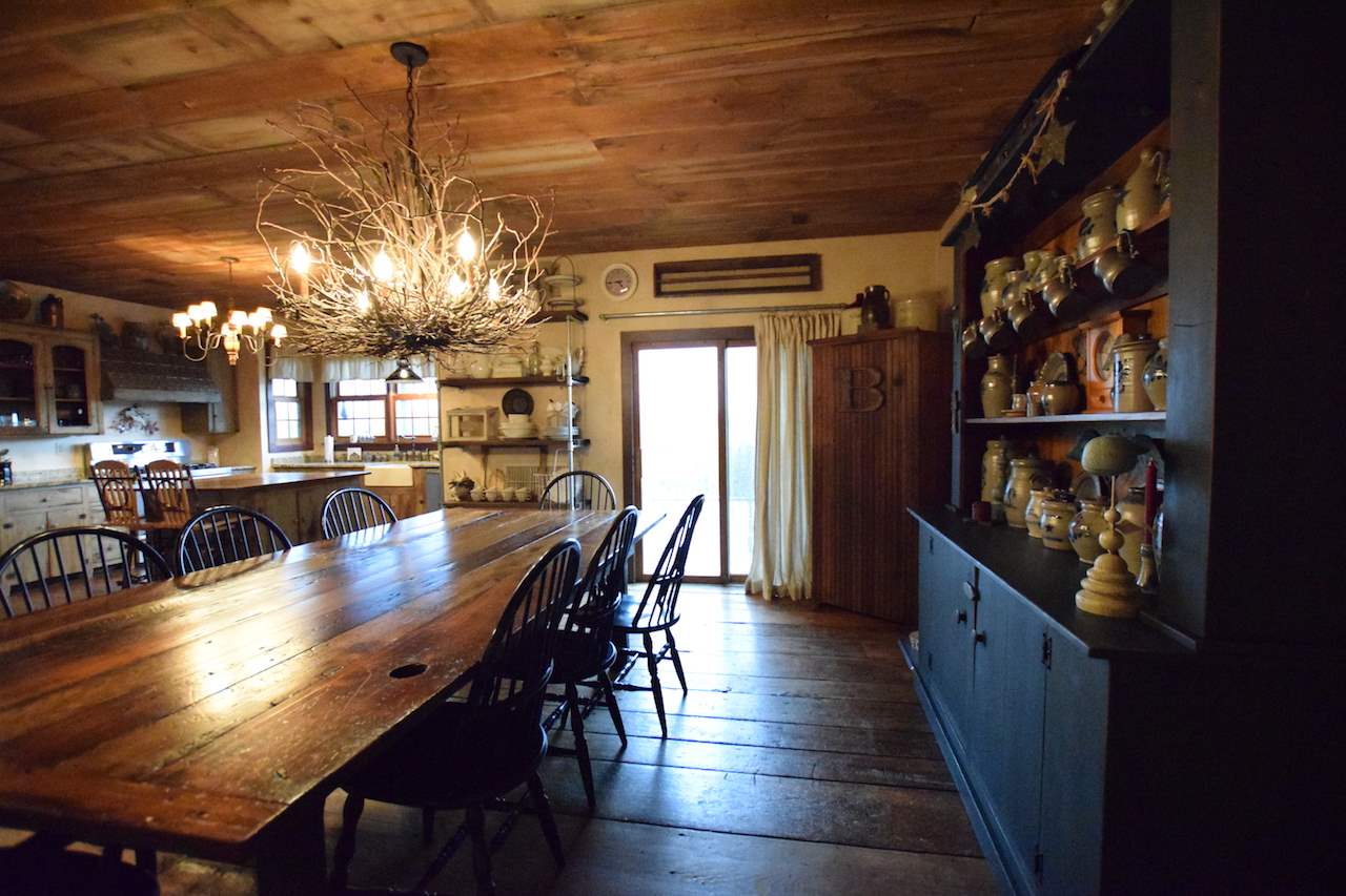 929 East State Line Road Orangeville, IL 61060 - Photo 9 of 25 a view of a dining room with furniture and a chandelier