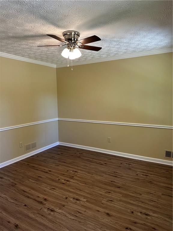3305 Maple Ridge Court Suwanee, GA 30024 - Photo 4 of 33 a view of an empty room with wooden floor