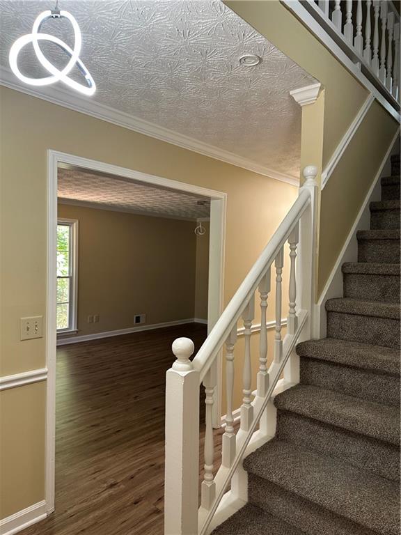 3305 Maple Ridge Court Suwanee, GA 30024 - Photo 6 of 33 a view of entryway with wooden floor