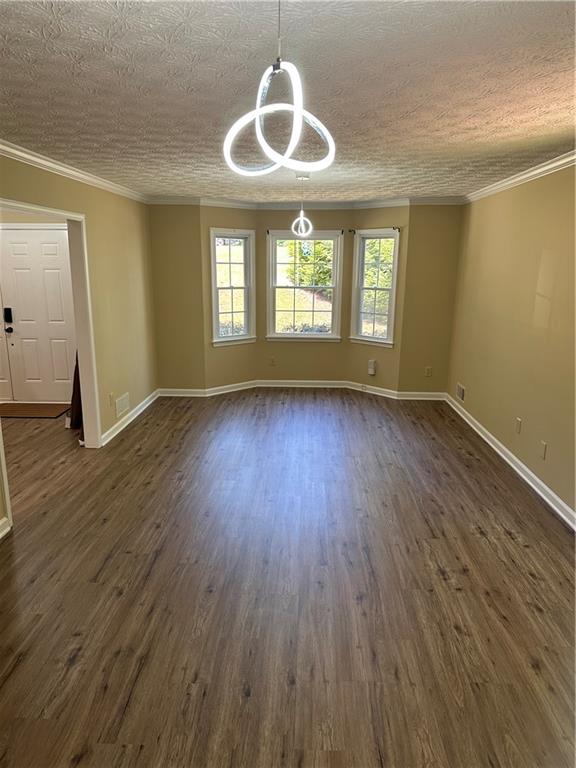 3305 Maple Ridge Court Suwanee, GA 30024 - Photo 8 of 33 an empty room with wooden floor and windows