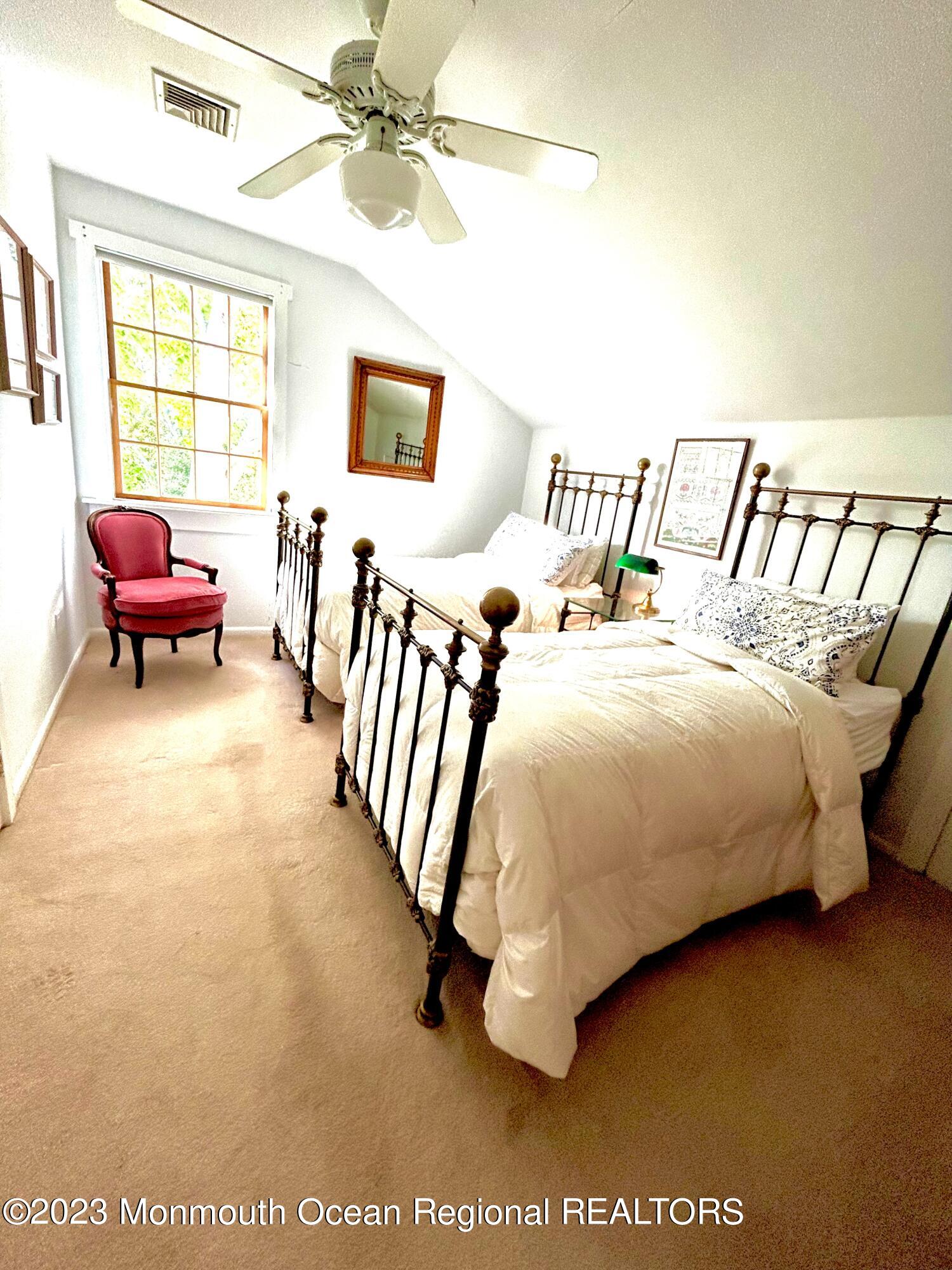 208 Passaic Avenue Spring Lake, NJ 07762 - Photo 13 of 19 a bedroom with bed and a window