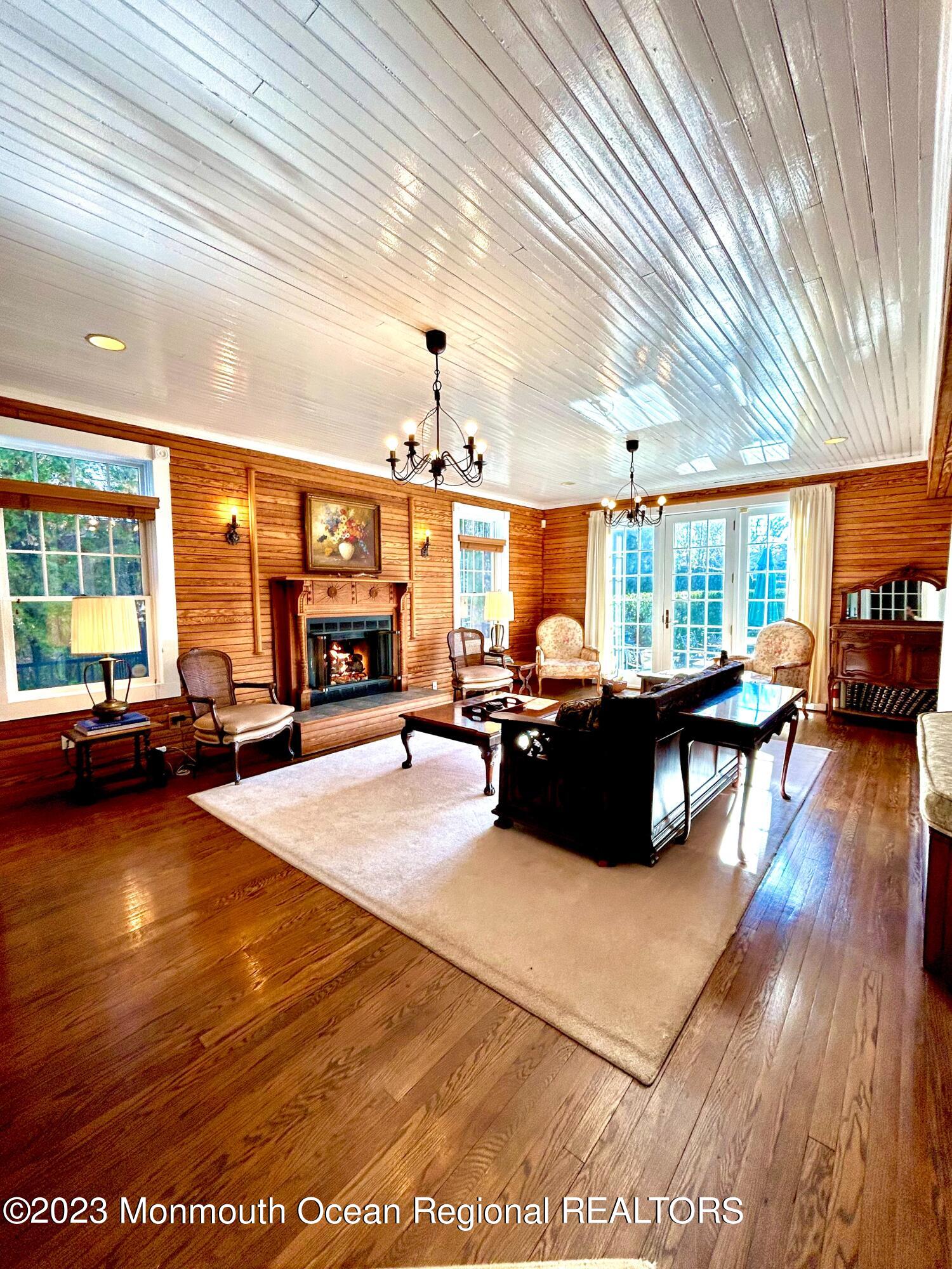 208 Passaic Avenue Spring Lake, NJ 07762 - Photo 17 of 19 a living room with lots of furniture and a large window