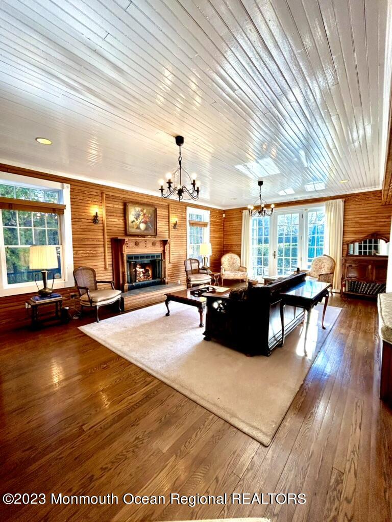 208 Passaic Avenue Spring Lake, NJ 07762 - Photo 8 of 19 a living room with furniture and a large window
